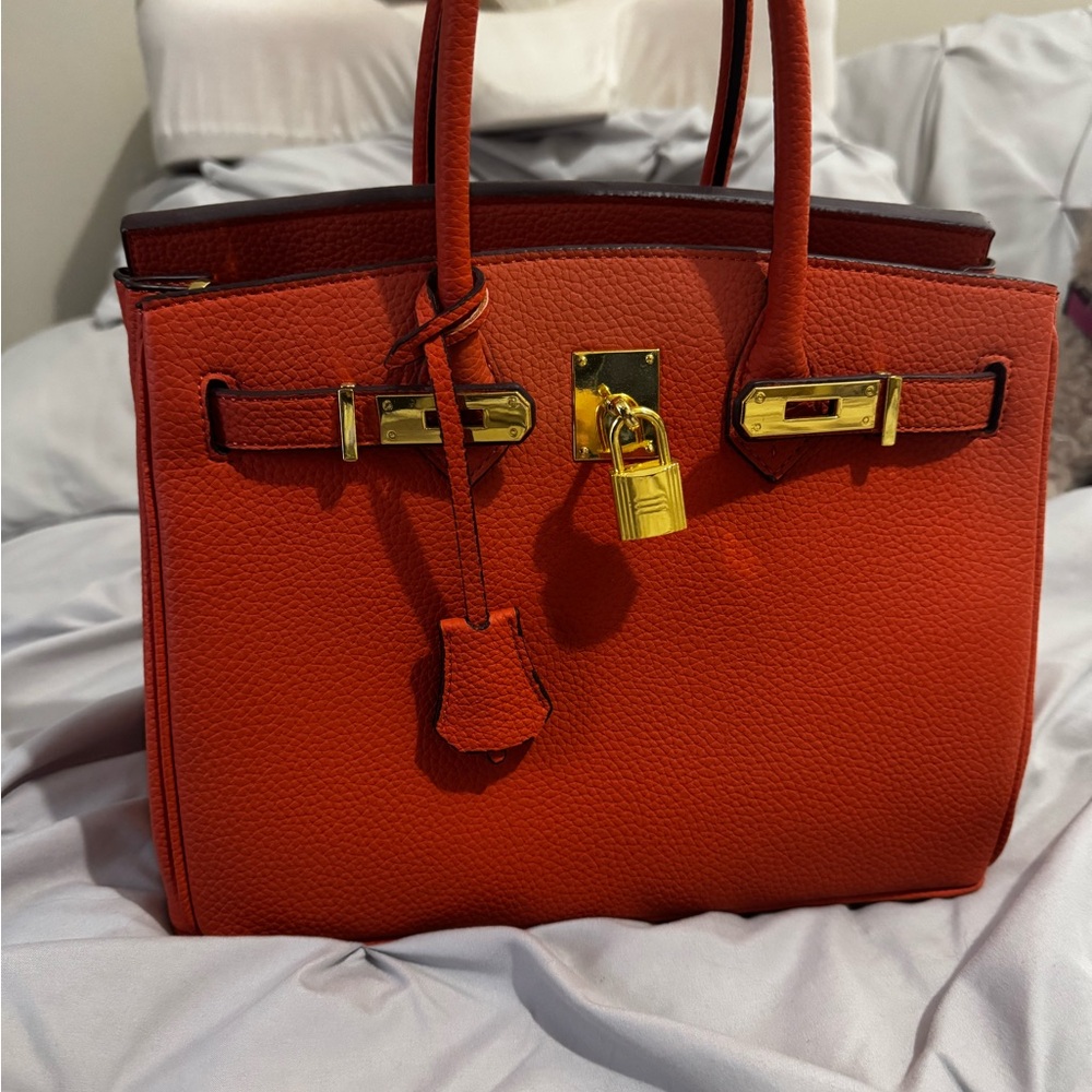 Elegant Orange Leather Handbag